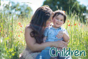 Mother and child in sunny outdoor portrait
