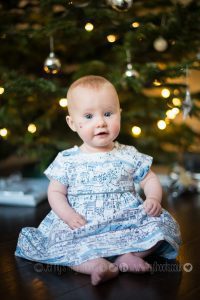 Baby portrait with Christmas tree