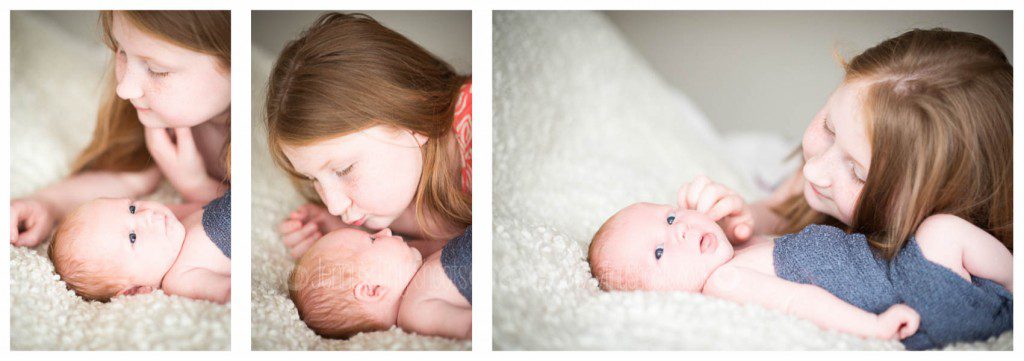 Newborn big sister kiss