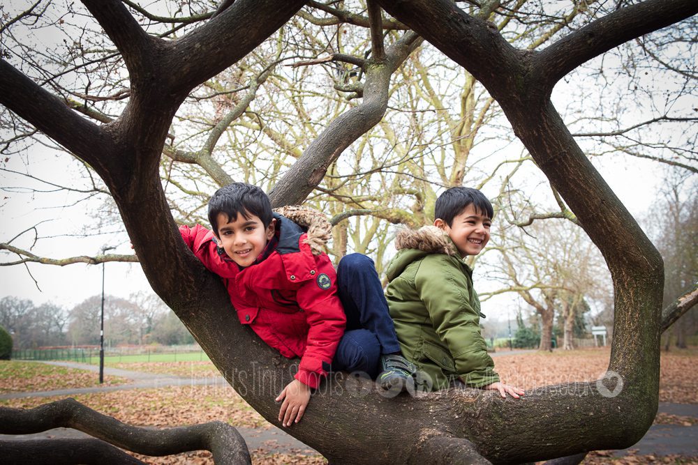 Winter family outdoor fun photos with twins in West London