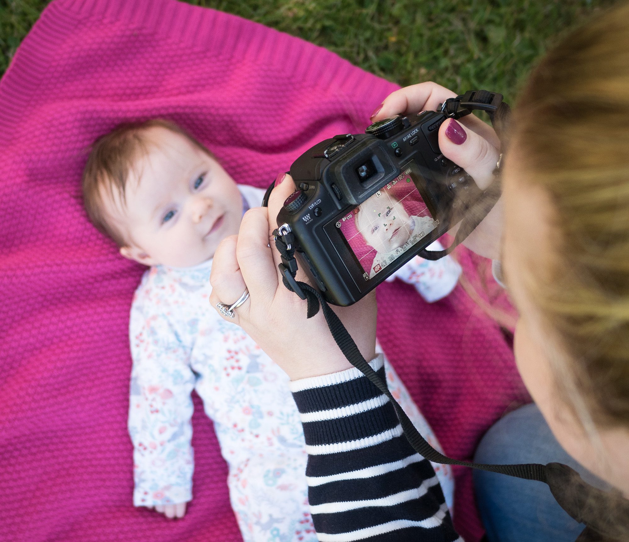 Learning to photograph baby on photography course