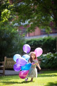 girl with balloons