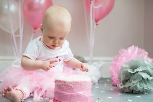 One year old girl with cake