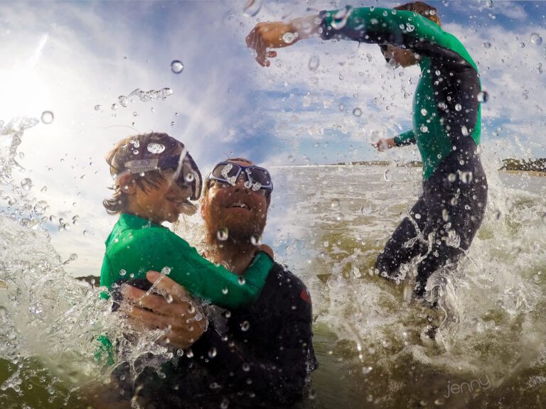 Portrait of people playing in the waves