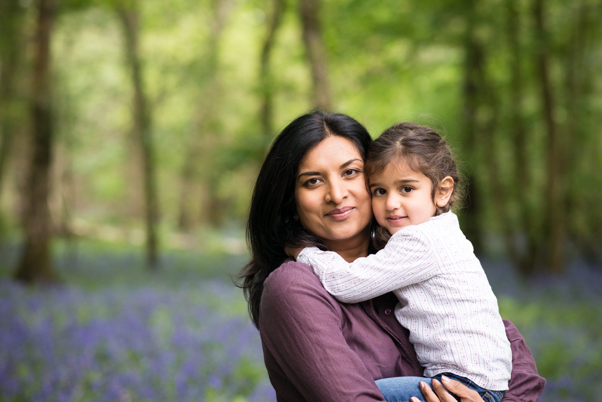 Mother and child portrait in the bluebell woods