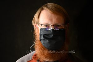 Man with beard in mask
