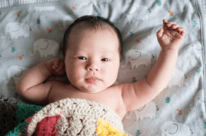 Newborn baby stretching