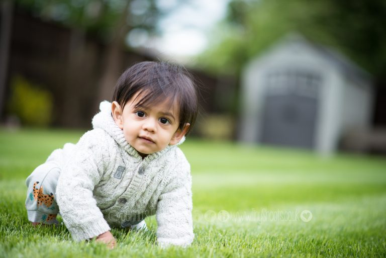 one year old boy crawling