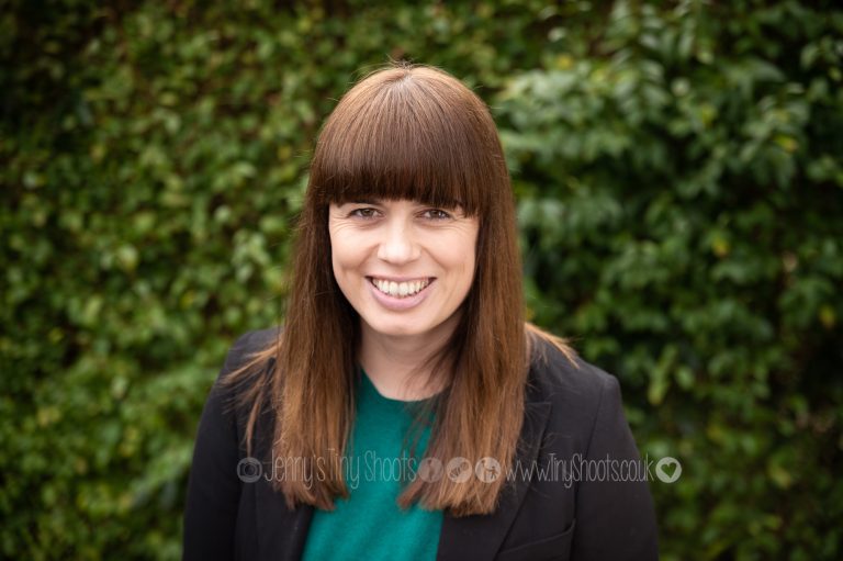 Business woman headshot portrait outdoors