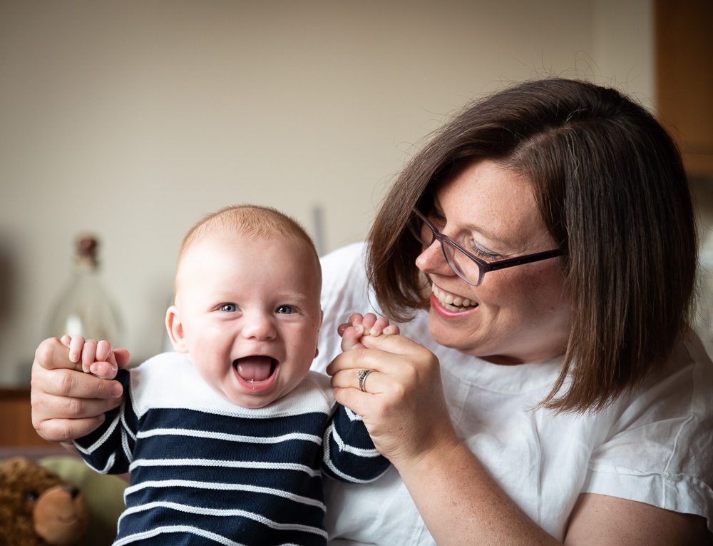 Family photo session of happy baby with mum