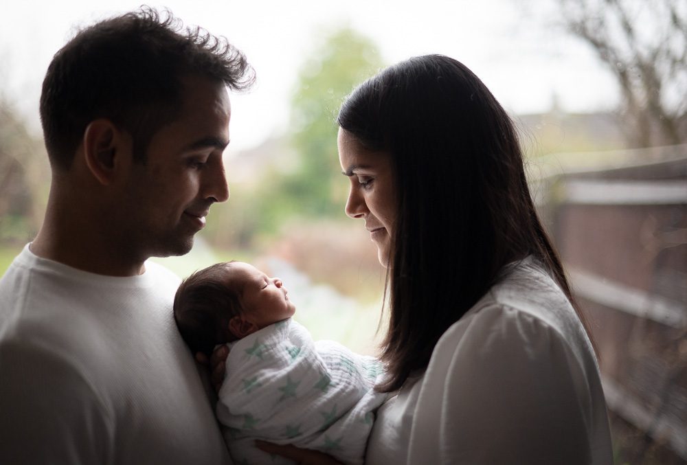 family photography at home in london, Newborn baby with parents