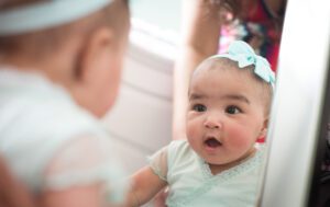 baby in the mirror