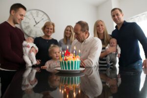 60th Party photo with babies and cake
