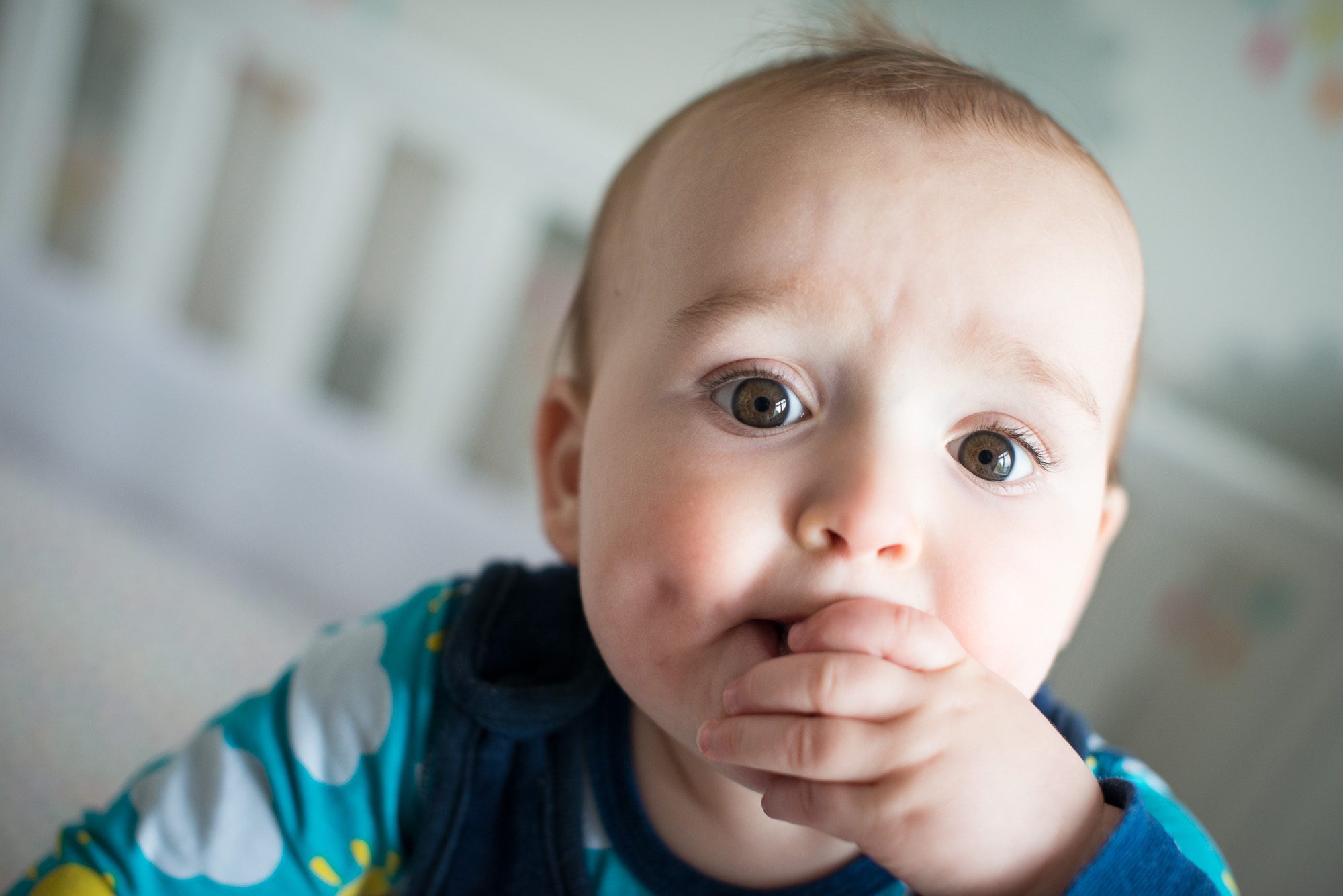 baby photography at home, baby boy standing in his cot