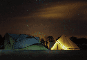 Tents on family campsite at night