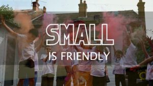 Small is Friendly title with children in background