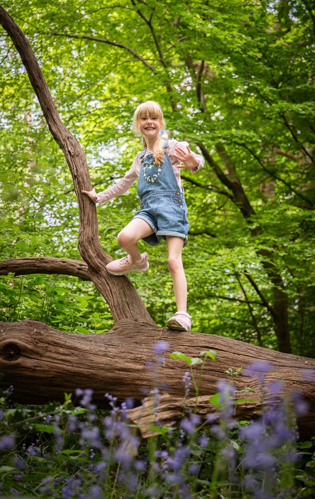 girl climbing in a tree