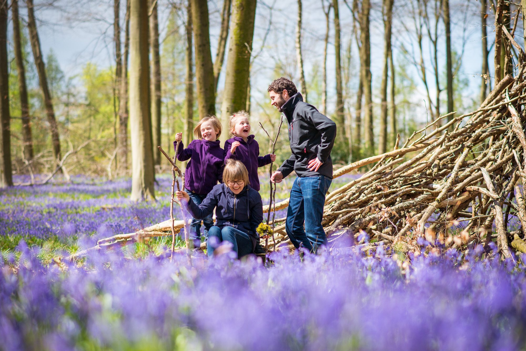 child portrait with family in the bluebell woods