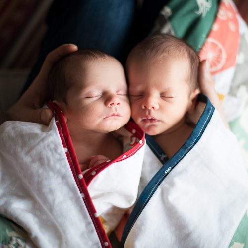 Newborn twins portrait wrapped together